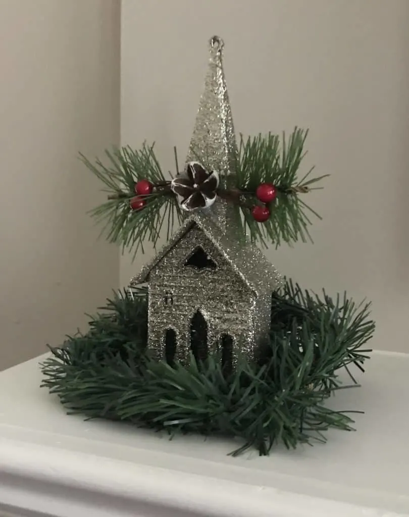 Glittery church decoration on a mantle