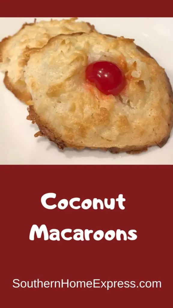 2 coconut macaroons with a cherry in the center