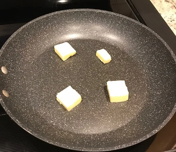 Melt butter in a large skillet.