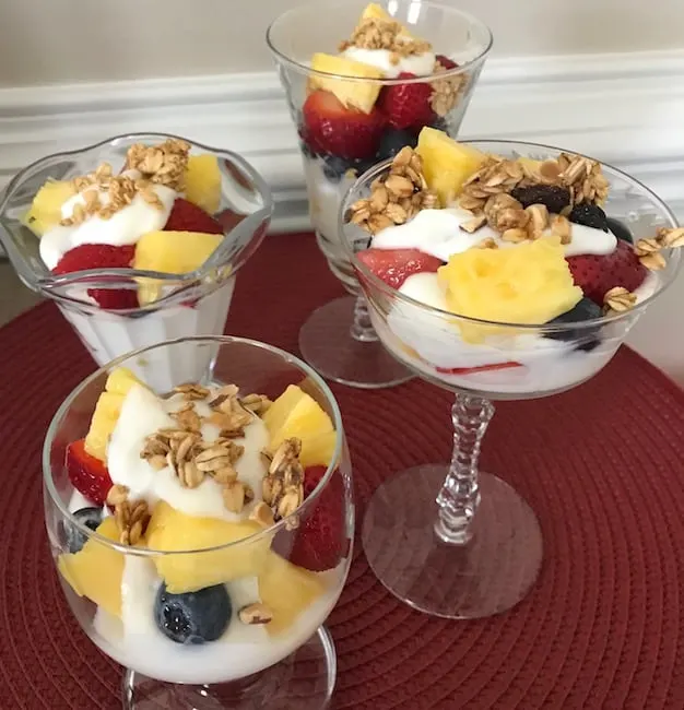 This fresh fruit and yogurt parfait is the ideal breakfast or dessert. Serve it in a clear glass dish for visual impact.