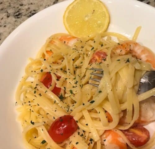 Bowl of shrimp fettuccine with a fork