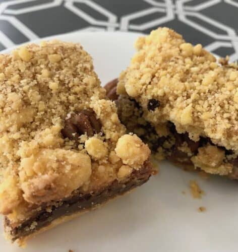 Chocolate caramel pecan bars on a plate