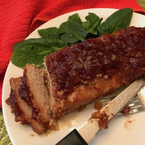 Sliced pork tenderloin on a plate