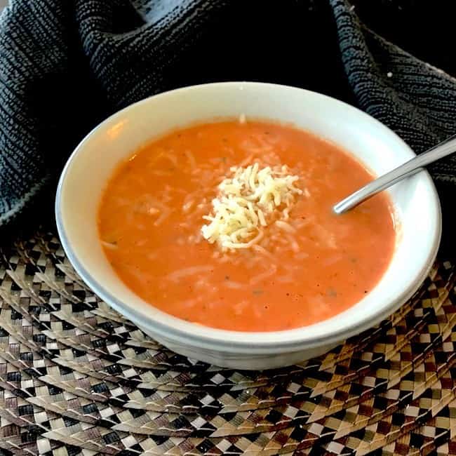 bowl of tomato soup with cheese