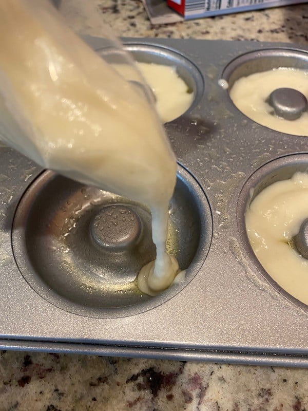 Piping batter out of a plastic bag