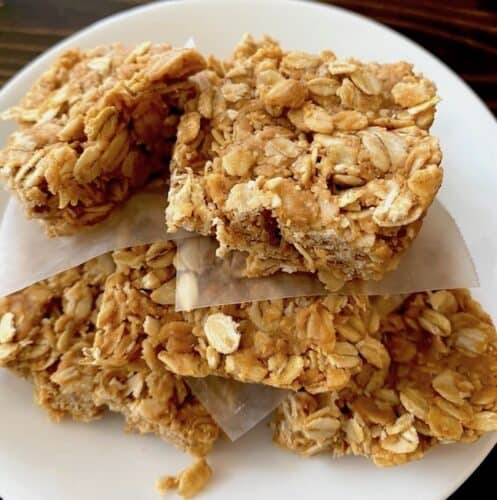 Oatmeal peanut butter bars stacked on a plate