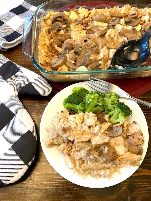 chicken and rice casserole on a plate and in a pan