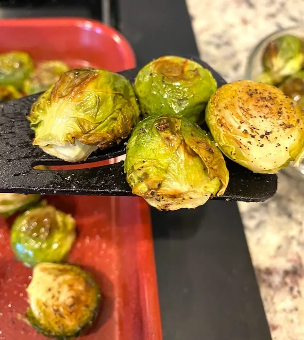 Brussels sprouts on a spatula