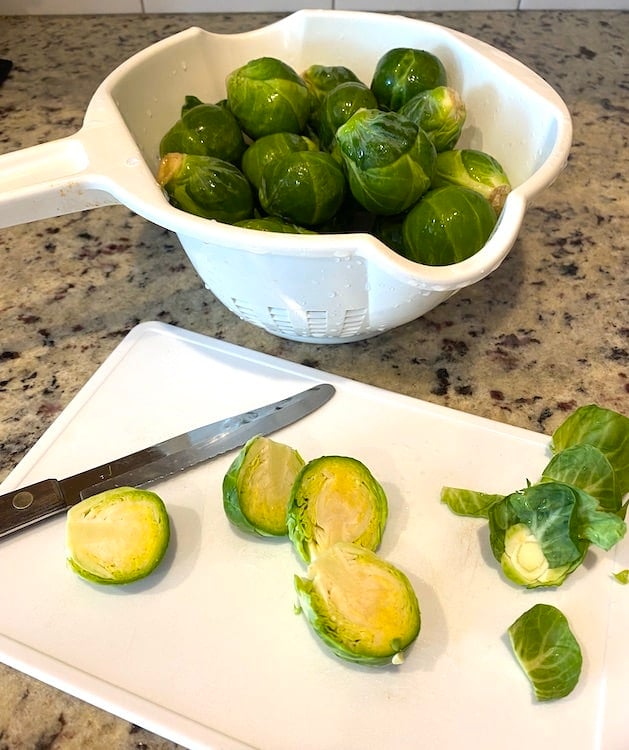 Prepping the veggies in a colander and on a cutting board