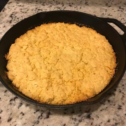 Baked cornbread in an iron skillet
