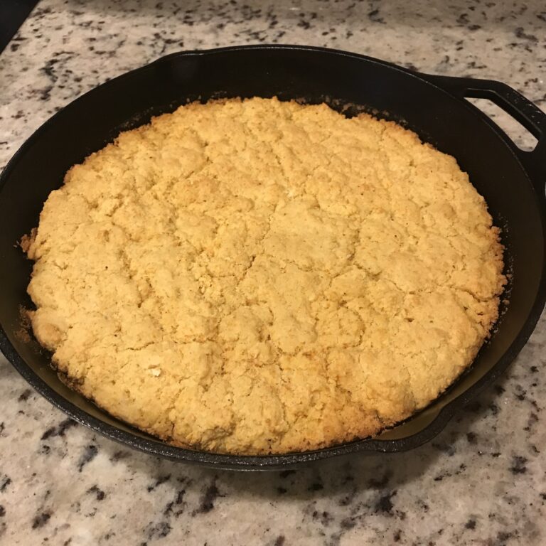 Baked cornbread in an iron skillet