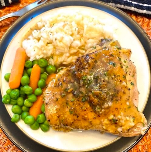 plate of lemon pepper chicken, rice, and mixed vegetables