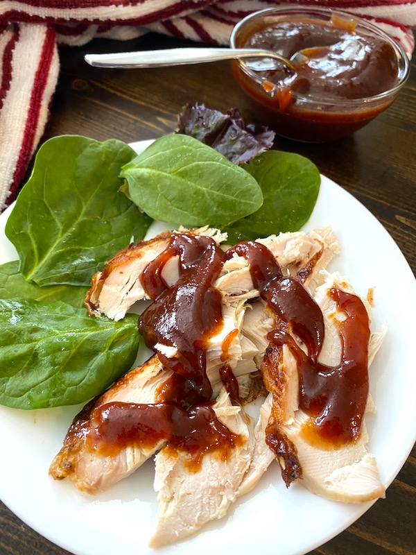 chicken with barbecue sauce on a plate