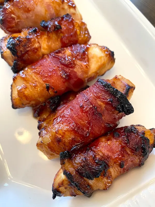 plate of bacon wrapped chicken tenders