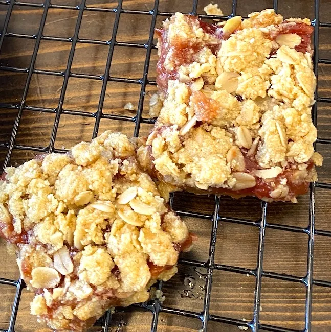 oatmeal strawberry jam bars on a cooling rack