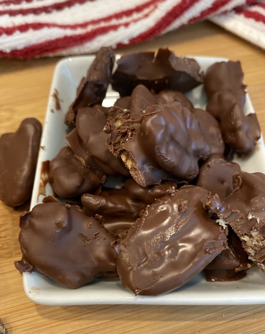 plate of homemade chocolate covered pecans