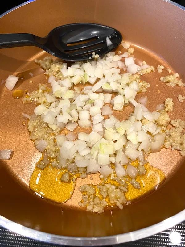 olive oil, garlic, and onions in a skillet