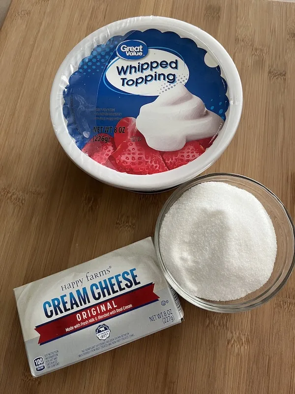 whipped topping, sugar, and cream cheese