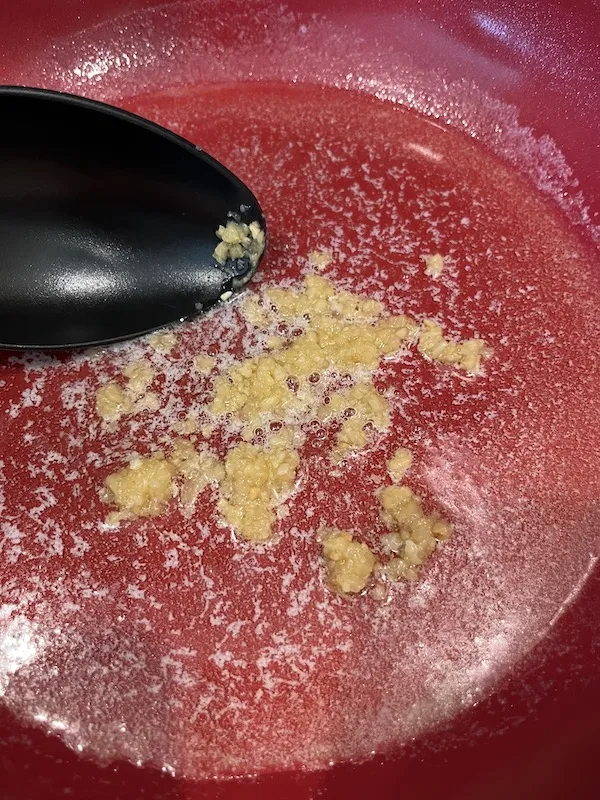 minced garlic in a skillet