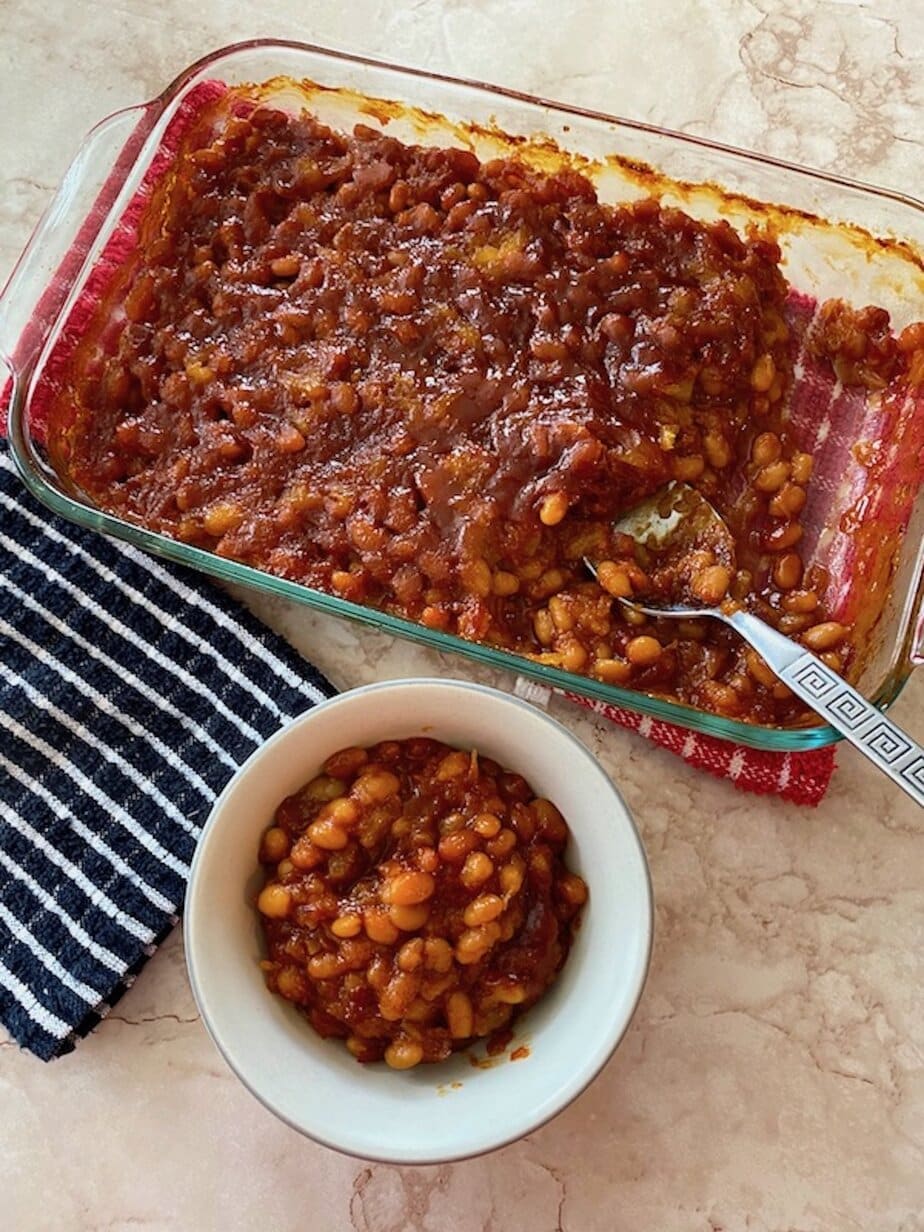 pan and bowl of pineapple baked beans