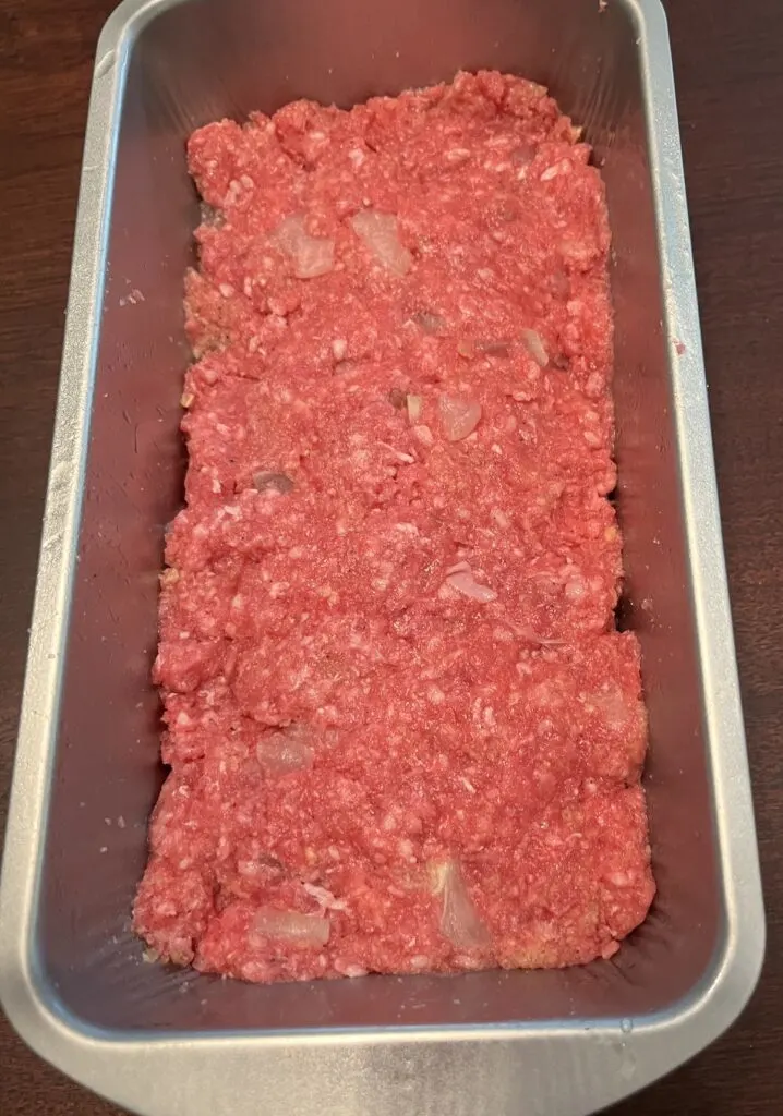 meatloaf mixture in a loaf pan