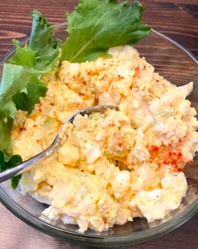 egg salad in a bowl with greens