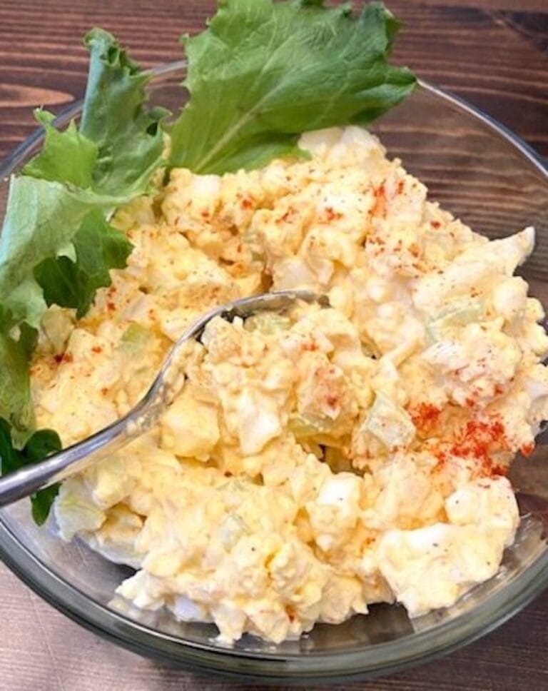 egg salad in a bowl with greens