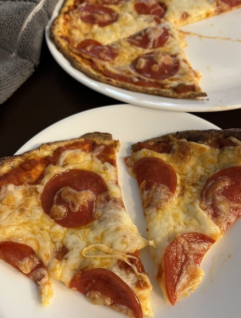 close-up of sliced pepperoni pizza