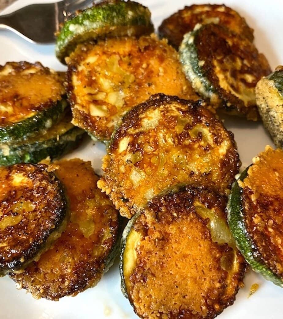 plate of oven-baked zucchini parmesan crisps