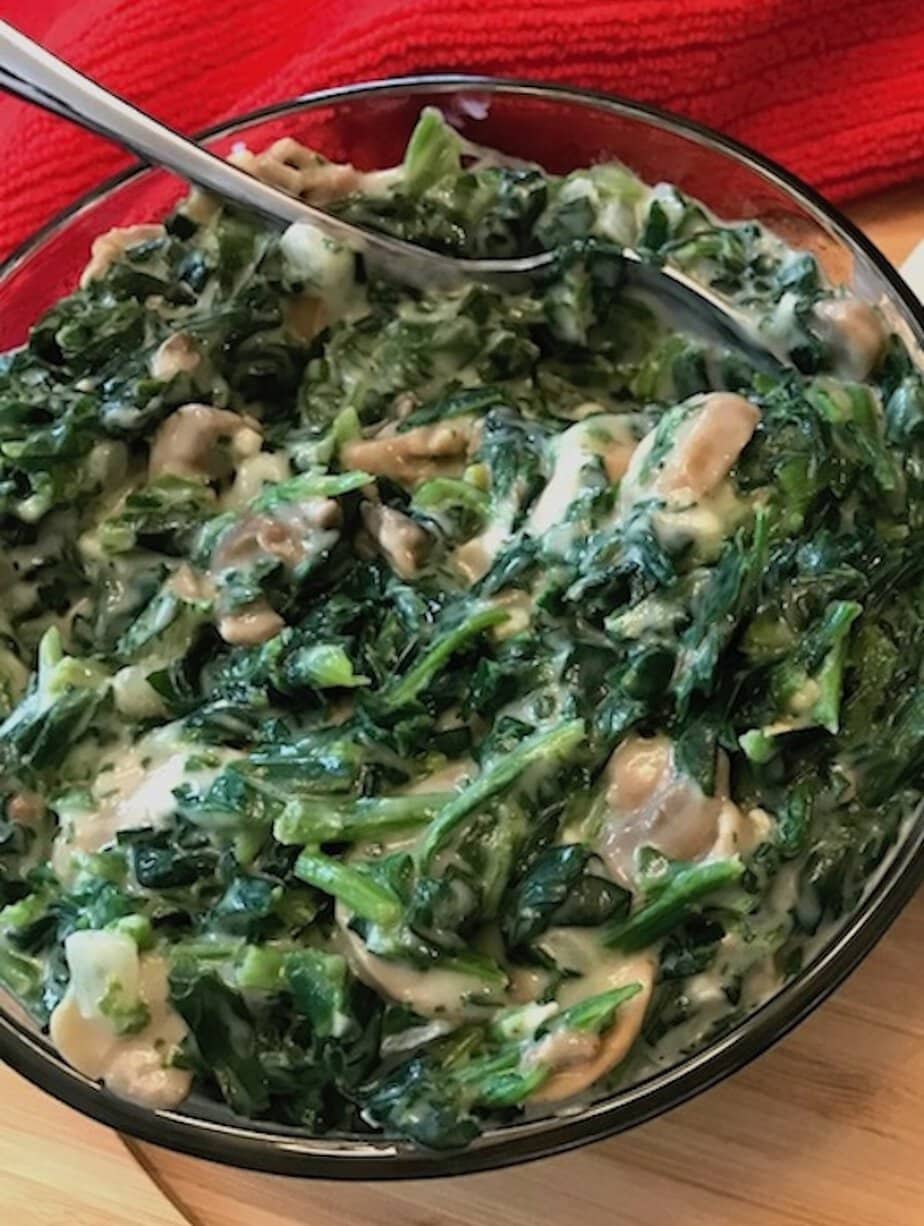 bowl of creamed spinach with mushrooms