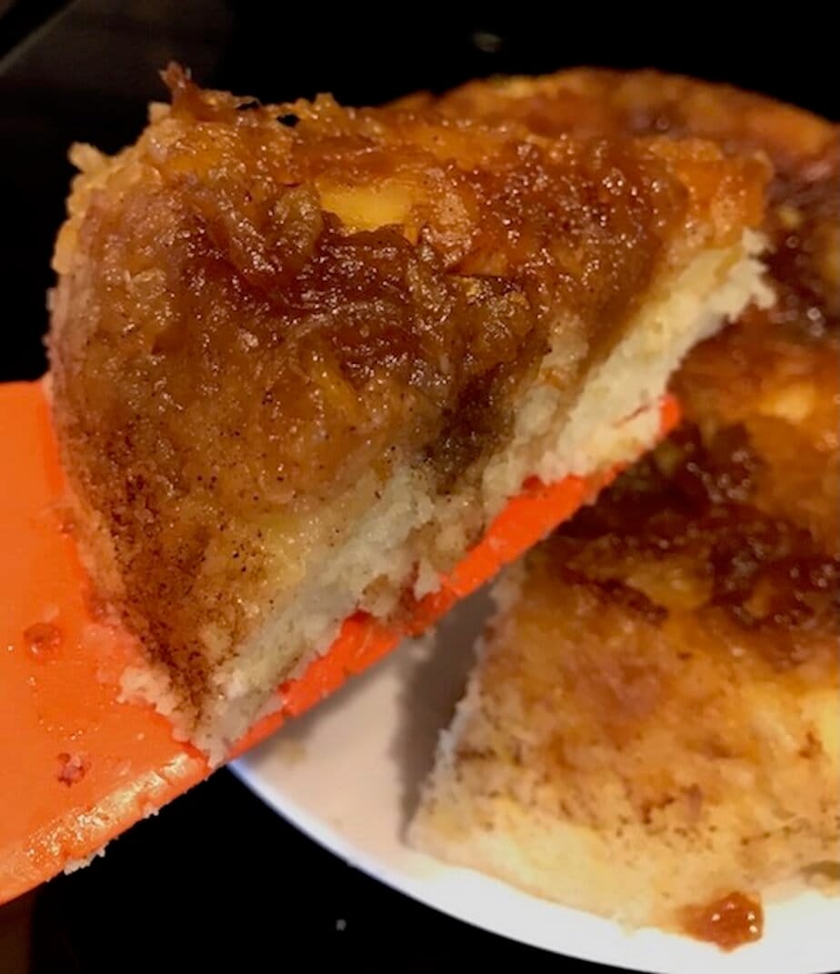 serving slice of pineapple upside down cake