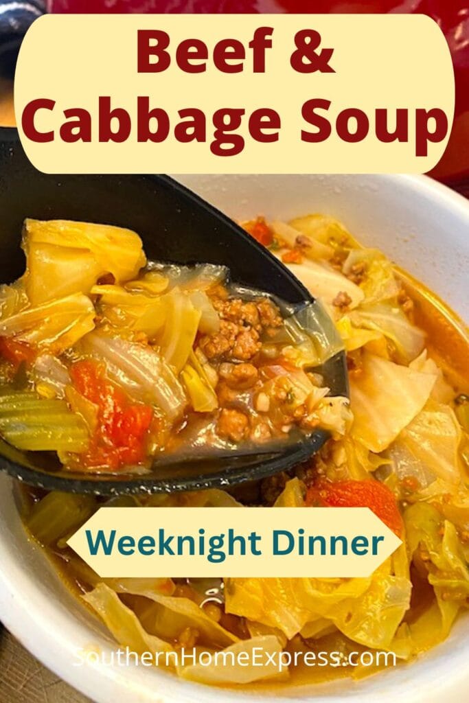 spoon dipping into a bowl of beef and cabbage soup