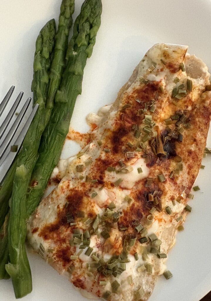 baked ranch fish and asparagus on a plate