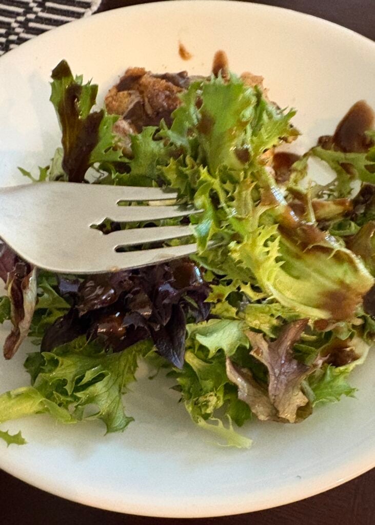 forkful of salad with balsamic vinaigrette dressing